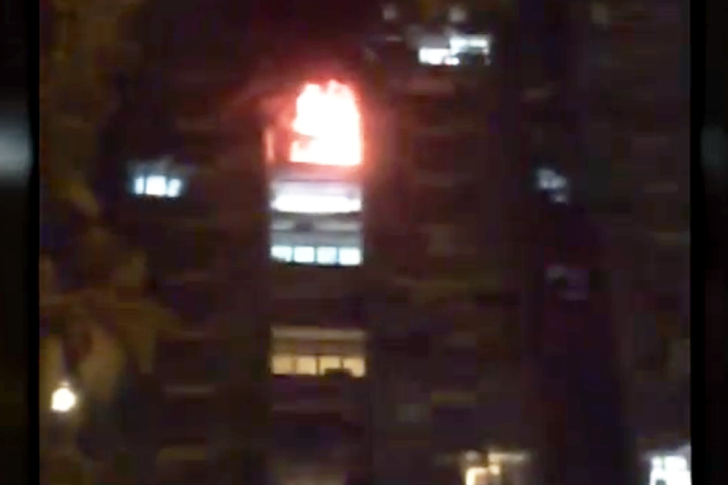 A screengrab provided by a resident of Siu Sai Wan Estate shows flame engulfing the flat. Photo: SCMP Pictures