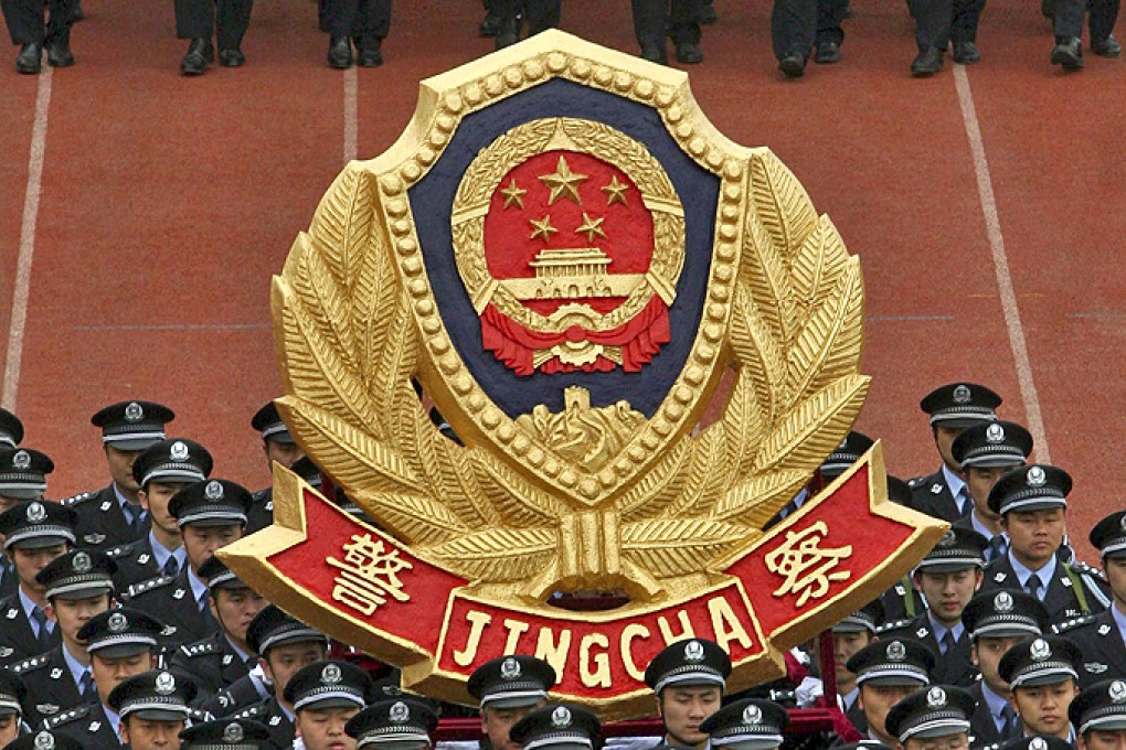 The mainland China police emblem. Photo: Reuters