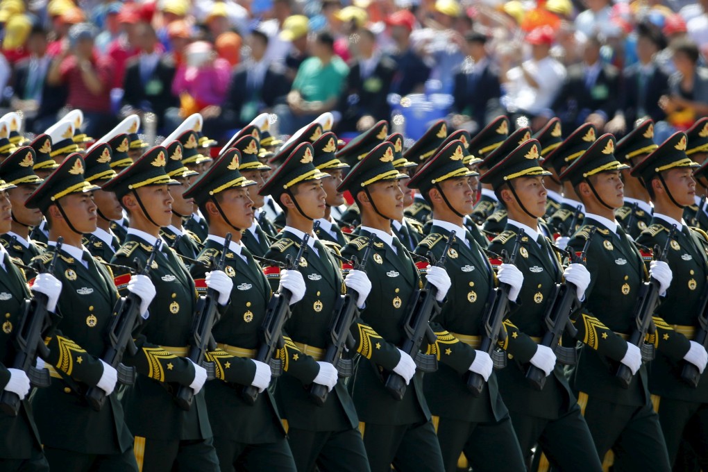 Soldiers of China's People's Liberation Army march during a military parade in Beijing in September. Photo: Reuters