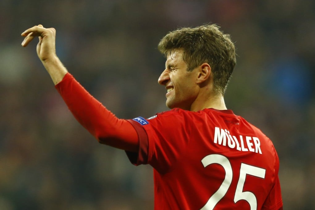 Thomas Mueller celebrates scoring No.5. Photo: AP