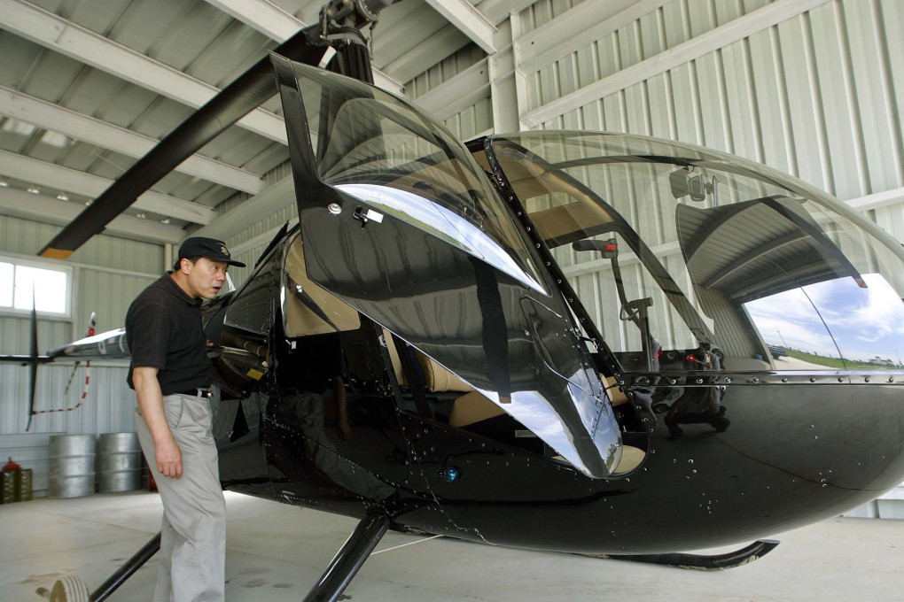 A Robinson R-44 helicopter, like the one operated by Cheng Weishi. Photo: AFP