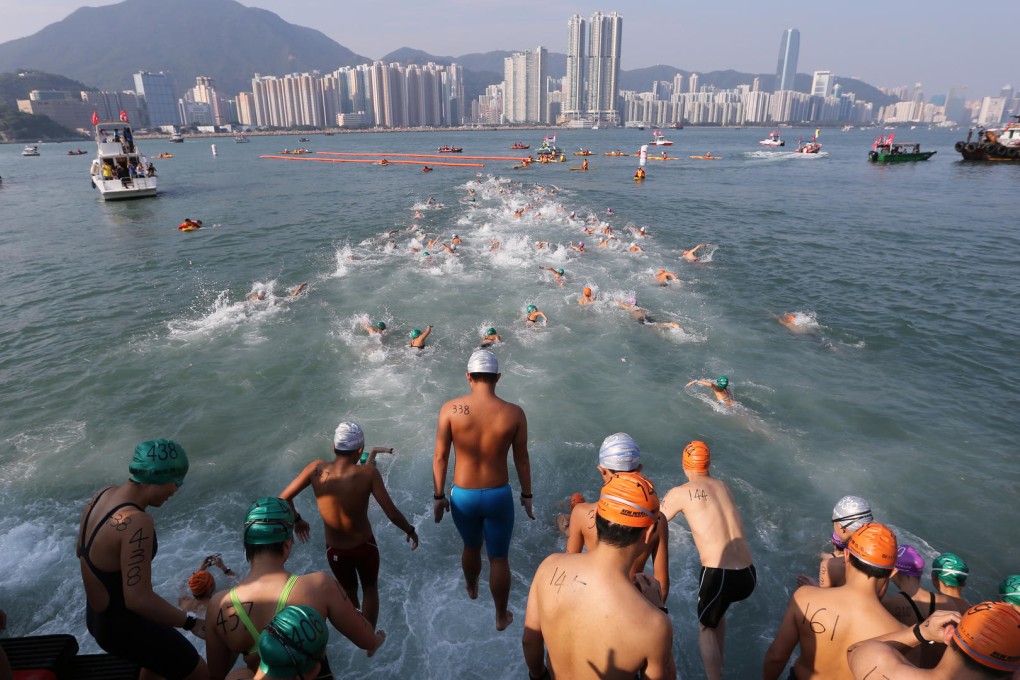 Swimmers compete again in the cross-harbour race, which was suspended for 33 years due to pollution. Photo: Sam Tsang