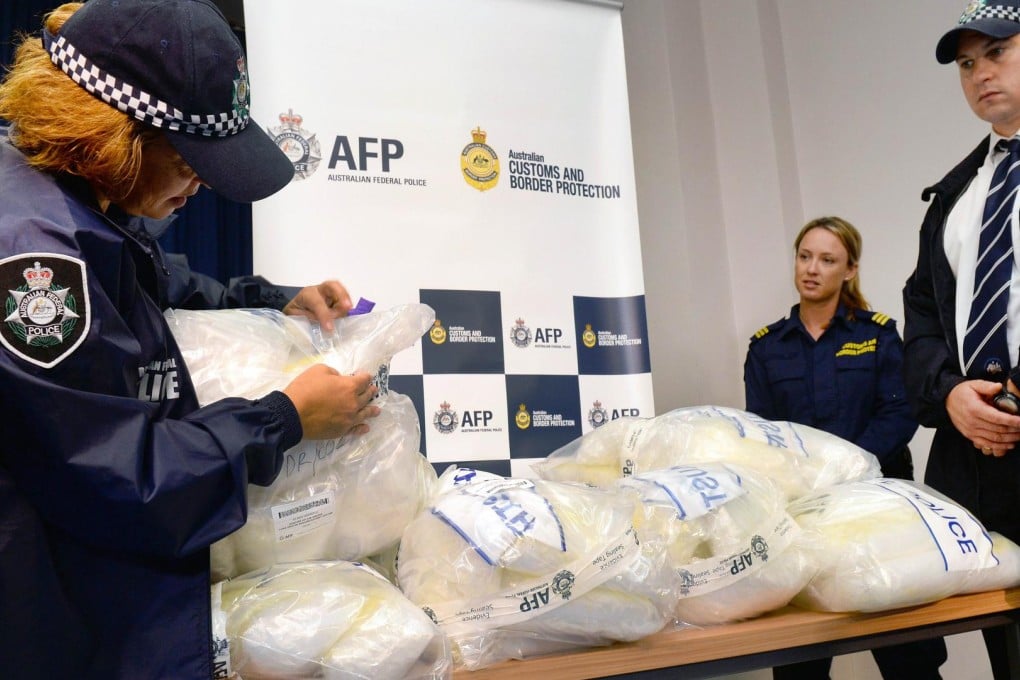 Australian police show off methamphetamine which had been hidden in kayaks from China. Photo: AFP