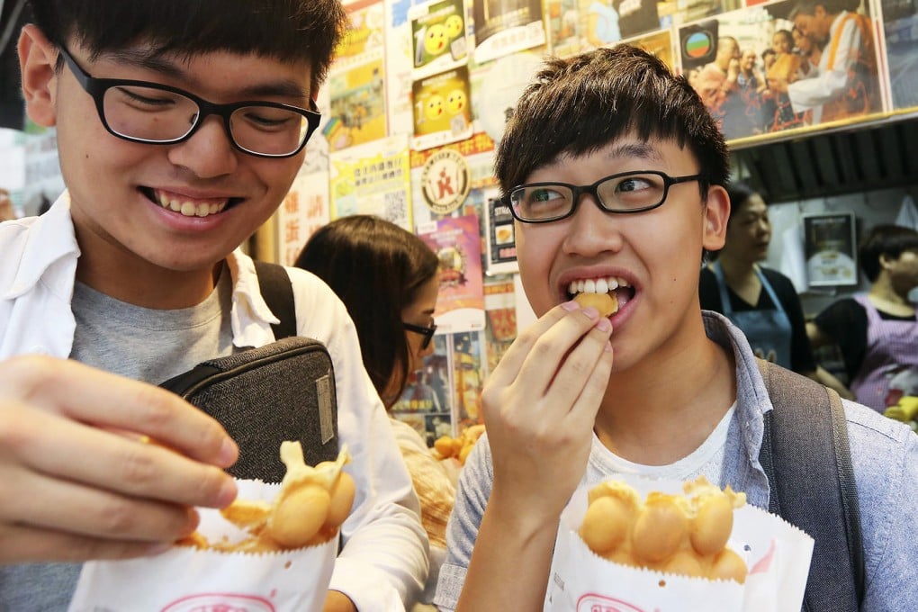 Lee Keung Kee in North Point gets a mention for its egg waffles in the street food section of the Michelin Guide. Photo: Edward Wong