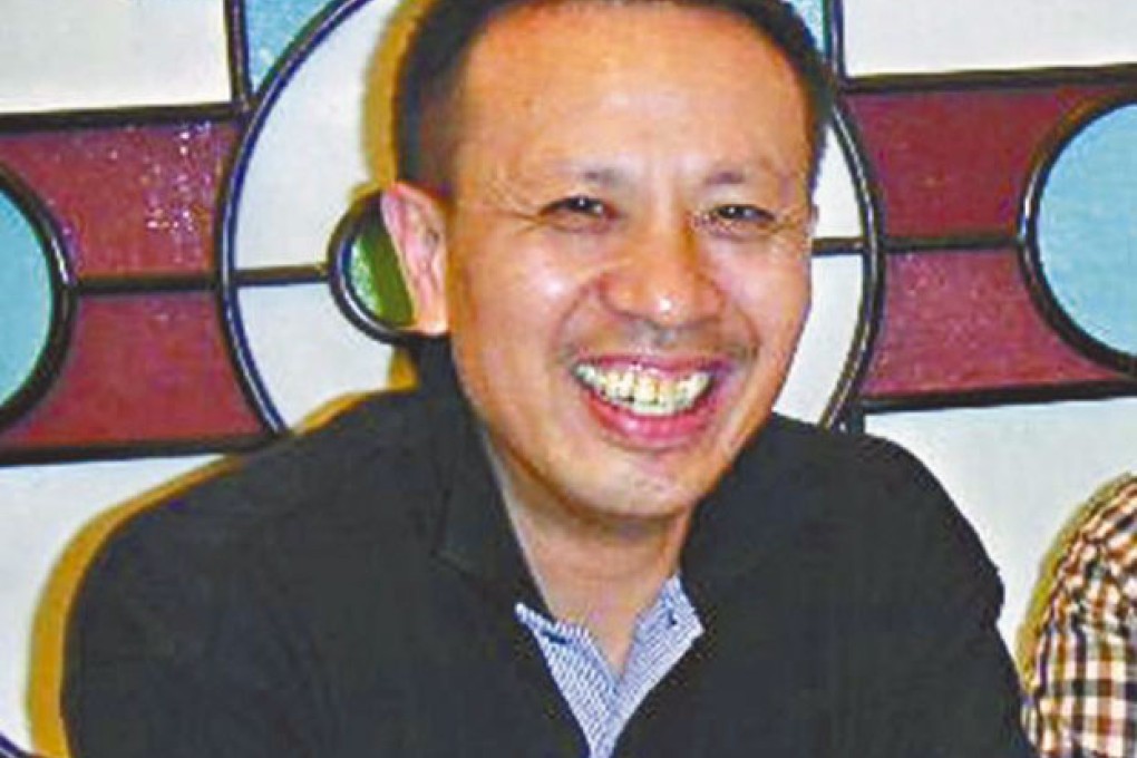 Publisher Wang Jianmin appeared in Nanshan district court. File photo