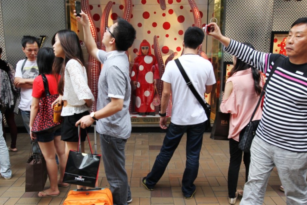 A new measure would require visitors' names to be reviewed by the city's tourism watchdog so that those who coerce visitors into shopping could be identified. Photo: SCMP Pictures