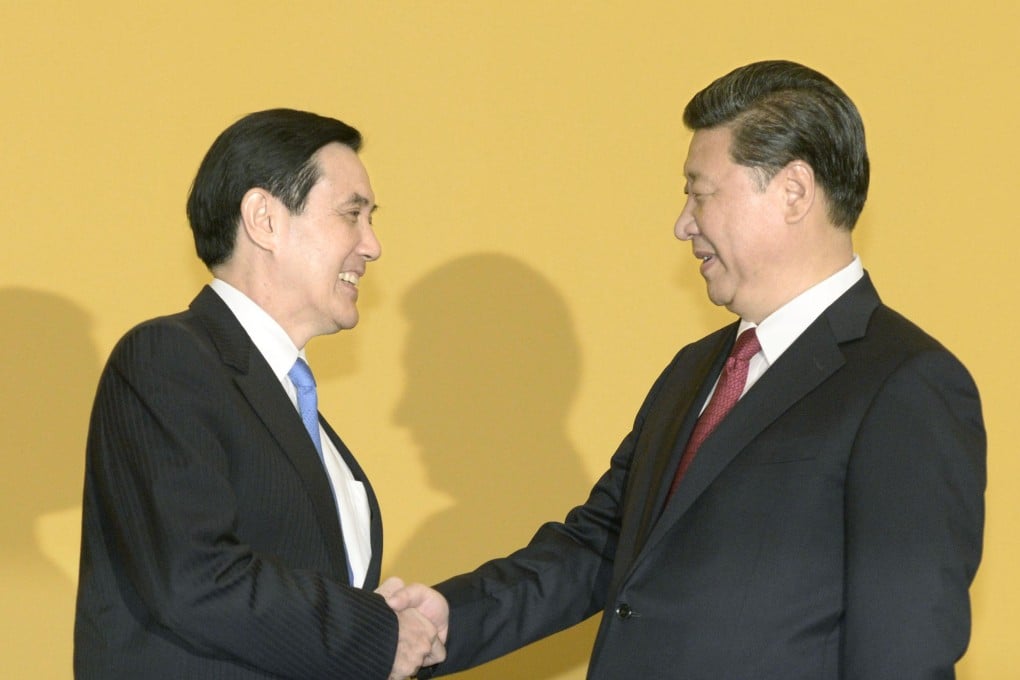 Chinese President Xi Jinping (right) shakes hands with his Taiwan counterpart Ma Ying-jeou before the start of the first cross-Taiwan Strait summit since a civil war divided the two sides in 1949. Photo: Kyodo
