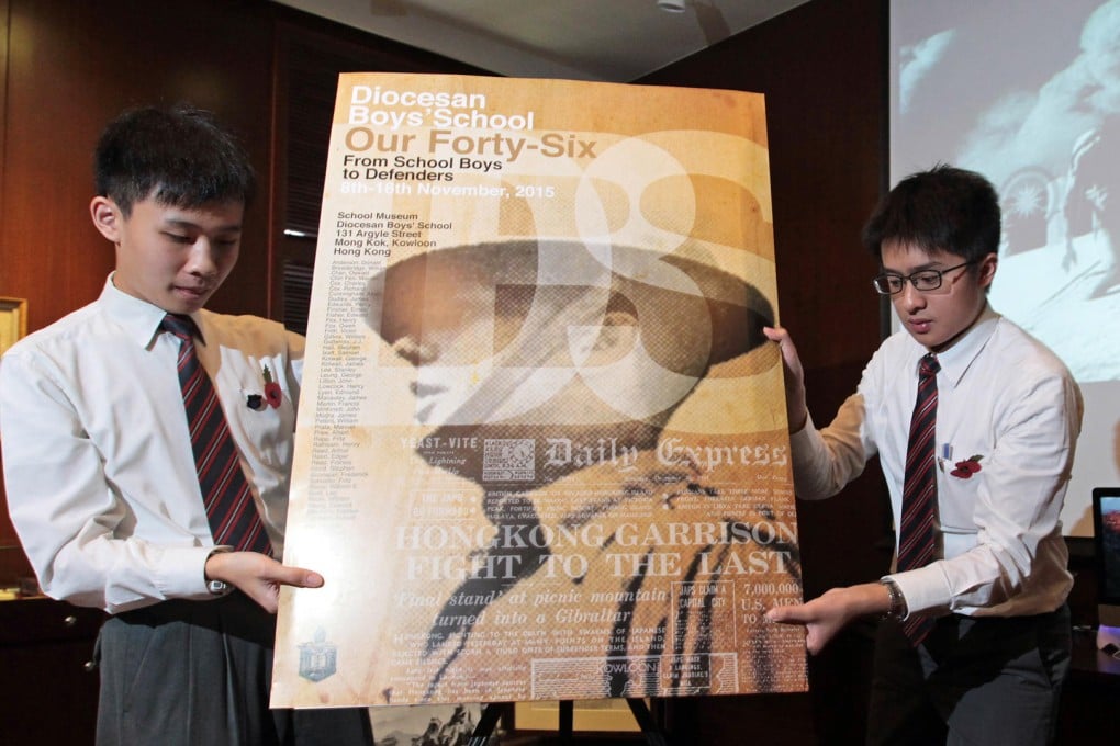Andre Cheng (left) and Clive Tsang prepare for the exhibition.