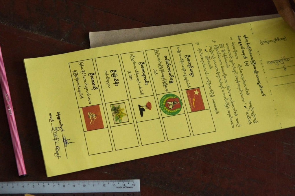Blank ballots are stacked at a polling station in Dala, while a Kayan woman and takes part in the poll. Photos: Reuters, AP, EPA