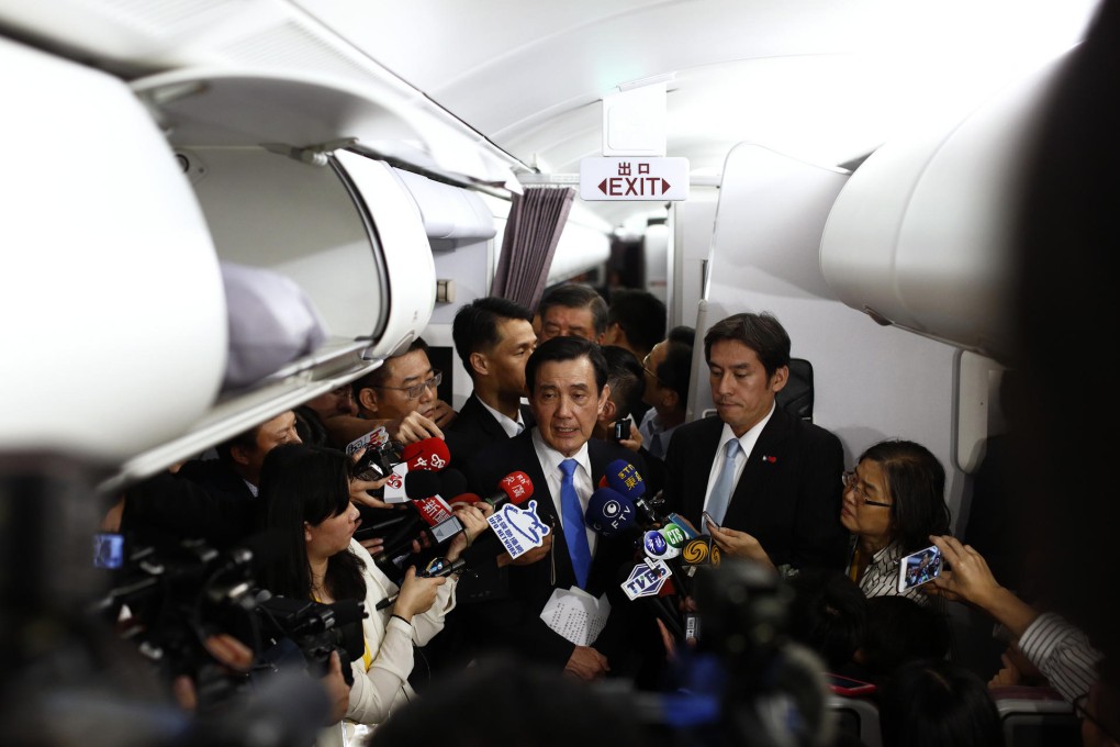 Taiwan's Ma Ying-jeou speaks to the media on his flight back to Taipei after Saturday's meeting with President Xi Jinping. Photo: Bloomberg