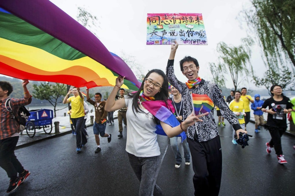 Gay rights activists take part in the Hangzhou marathon. Photo: AP