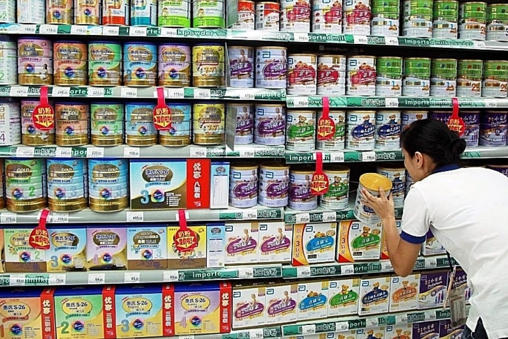 Foreign brands of infant formula are in high demand in China. Smuggling gangs avoid paying taxes by hiring individuals to carry small quantities of legally bought duty-free goods across the border. Stock Photo