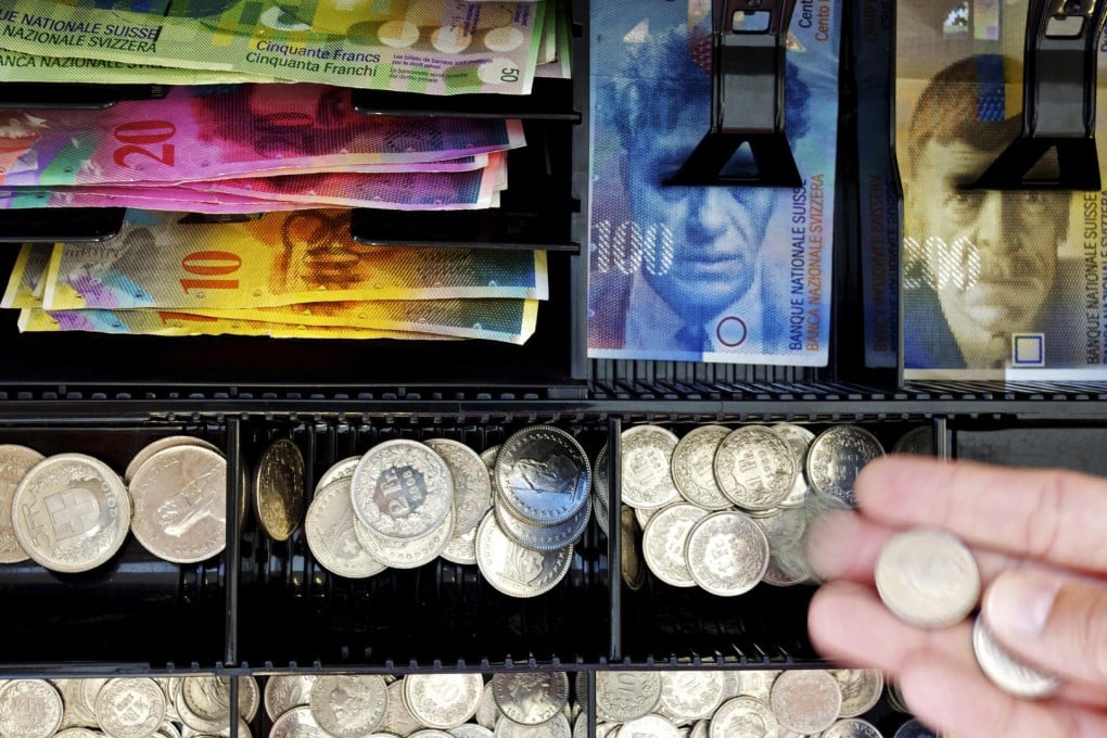 The Swiss franc will be allowed to fluctuate 5 per cent on either side of a central exchange rate set for the Chinese yuan. Photo: Bloomberg