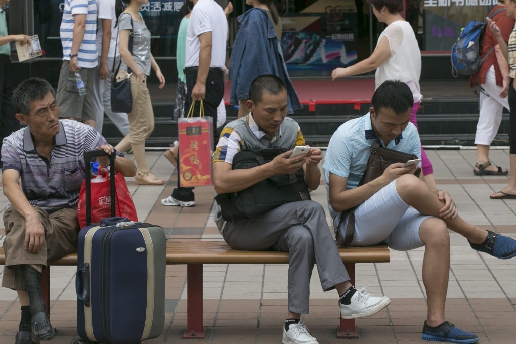 An app built by Chinese researchers can use motion sensors to detect happiness and anger. Photo: EPA