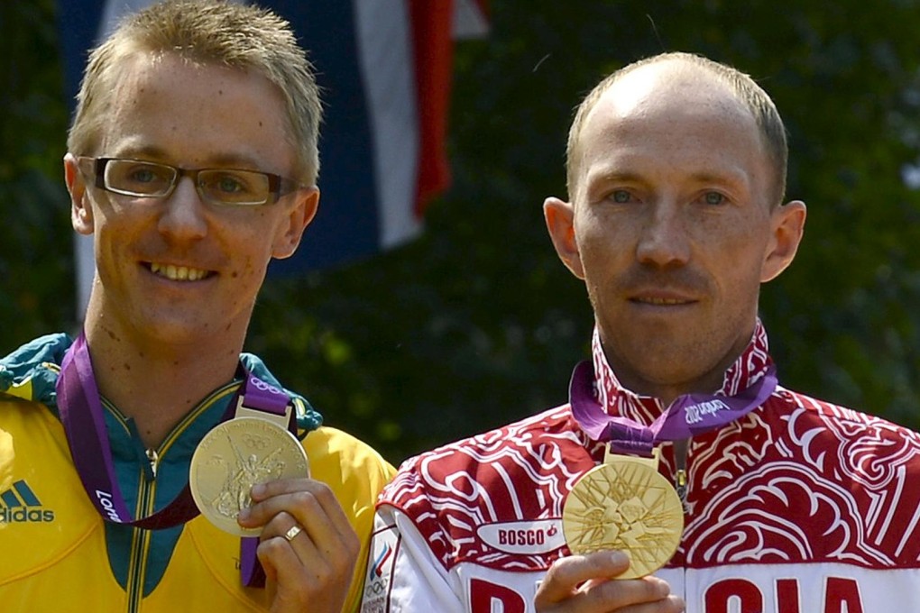 Aussie Jared Tallent was all smiles when he won silver behind Sergei Kirdyapkin in the 50km walk at the London Games ... but Tallent was not smiling when the Russian was later exposed as a drug cheat. Photo: Reuters