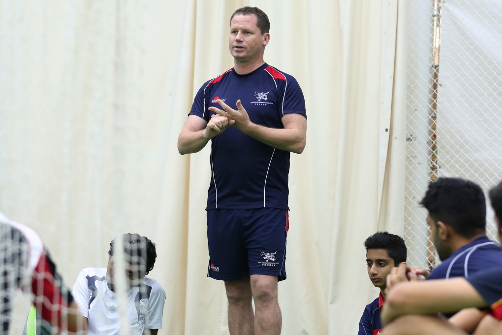 Charlie Burke, director of cricket for the HKCA, conducts a nets session with young players. Photo: Nora Tam