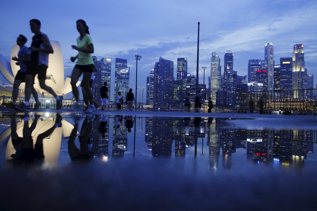 The quota move is aimed at strengthening cross-border flows in the yuan between Singapore and China. Photo: Reuters