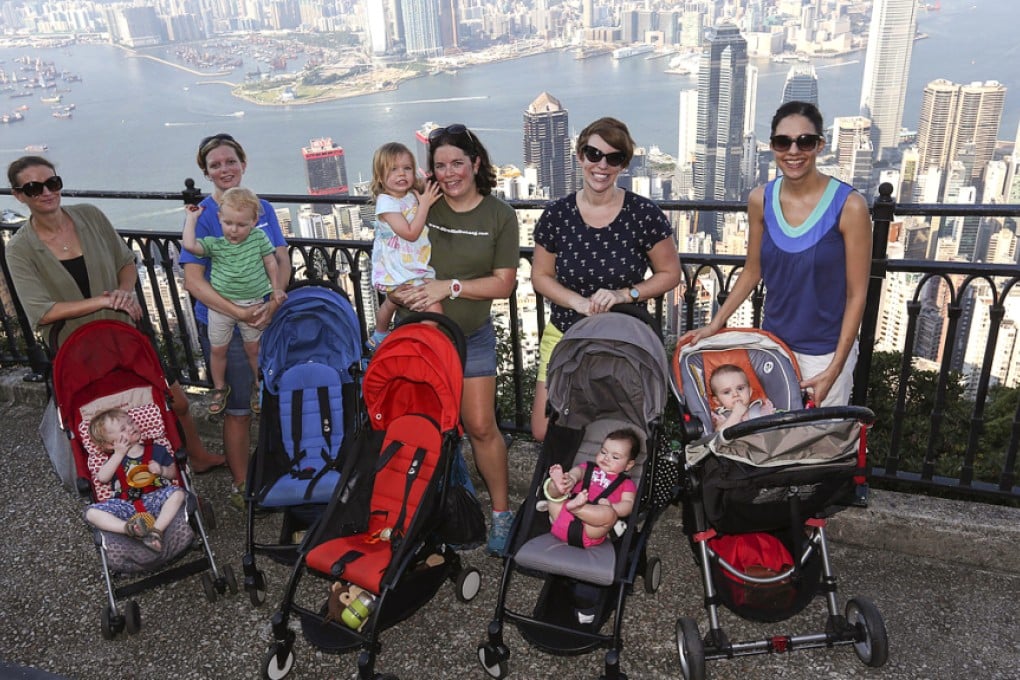 From far left: Cressida Martin with her son River, Rosie Fletcher with Rory, Charlotte Eriksen with her daughter Lyra, Sara Madera with her daughter East and Alice Kehey with Jessica. Photo: Edward Wong