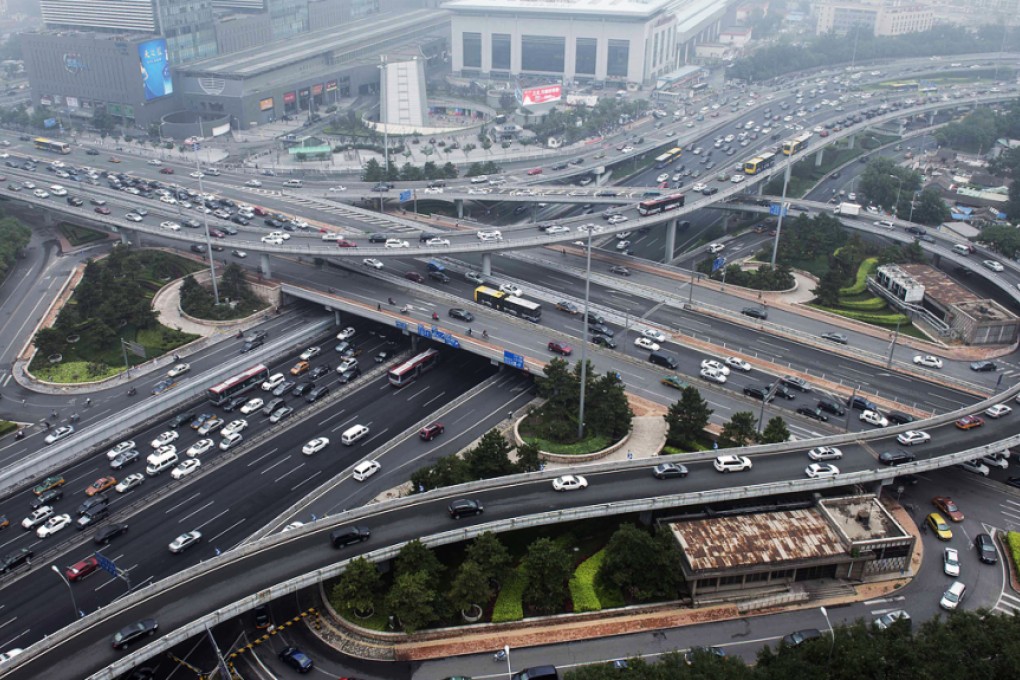 Slowing growth in property and manufacturing, as well as limited progress in attracting private capital in public-private partnerships, meant Beijing's investment in infrastructure and public facilities was now a "one-man show" in addressing downward risks, said State Information Centre researcher Li Ruoyu. Photo: AFP