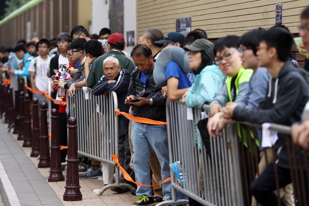 Hordes of football fans queued up for tickets for the Hong Kong versus China World Cup qualifier outside Mong Kok Stadium on November 4. Photo: Sam Tsang