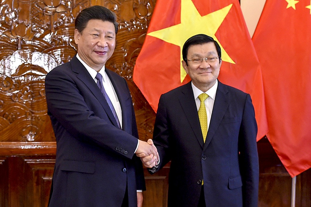 Chinese President Xi Jinping (left) holds talks with Vietnamese President Truong Tan Sang in Hanoi, Vietnam last Friday. Photo: Xinhua