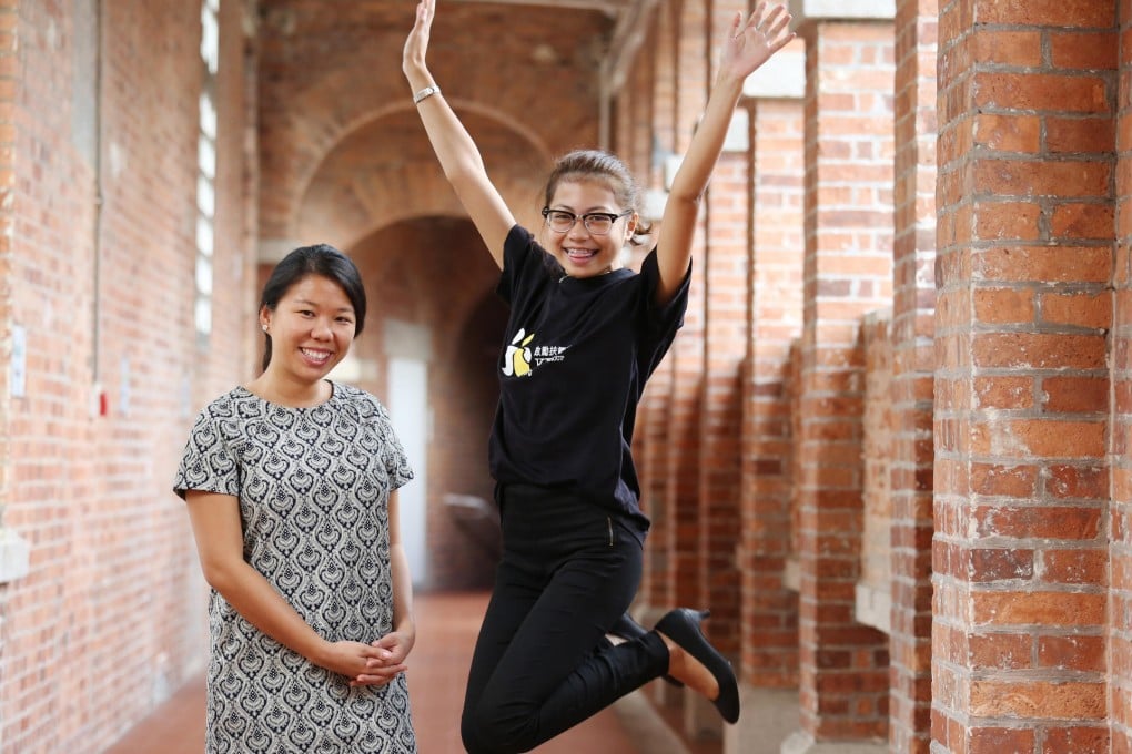 Sky Siu, executive director of the Kely Support Group, with Xyra Sace, a beneficiary.Photo: Nora Tam