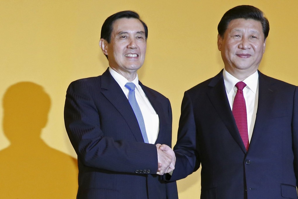 Taiwanese leader Ma Ying-jeou (left) with Chinese President Xi Jinping shake hands ahead of their meeting in Singapore on November 7. Photo: Reuters