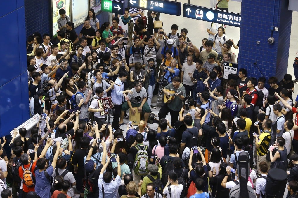 Musicians stage a protest at Tai Wai station against MTR policy on instruments. Photo: Sam Tsang