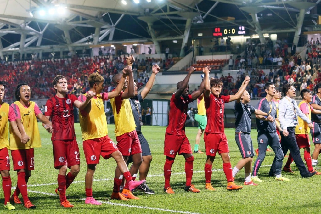 Hong Kong players celebrate a draw with China that will go down as one of their most famous results.Photo: K.Y. Cheng