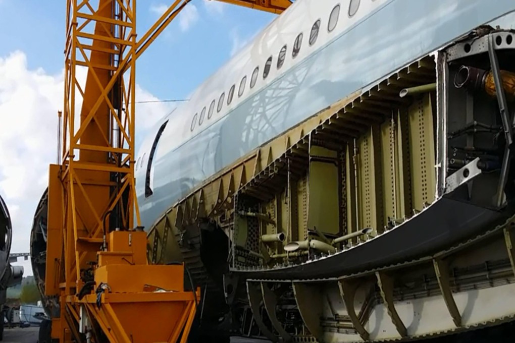 A Cathay aircraft is dismantled in France. Photo: SCMP Pictures