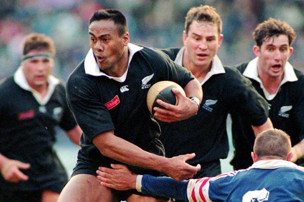 New Zealand All Blacks winger Jonah Lomu (second left) breaks the tackle of France's Philippe Benetton (right) during their rugby test match at Parc des Princes stadium in Paris in 1995. Photo: AP