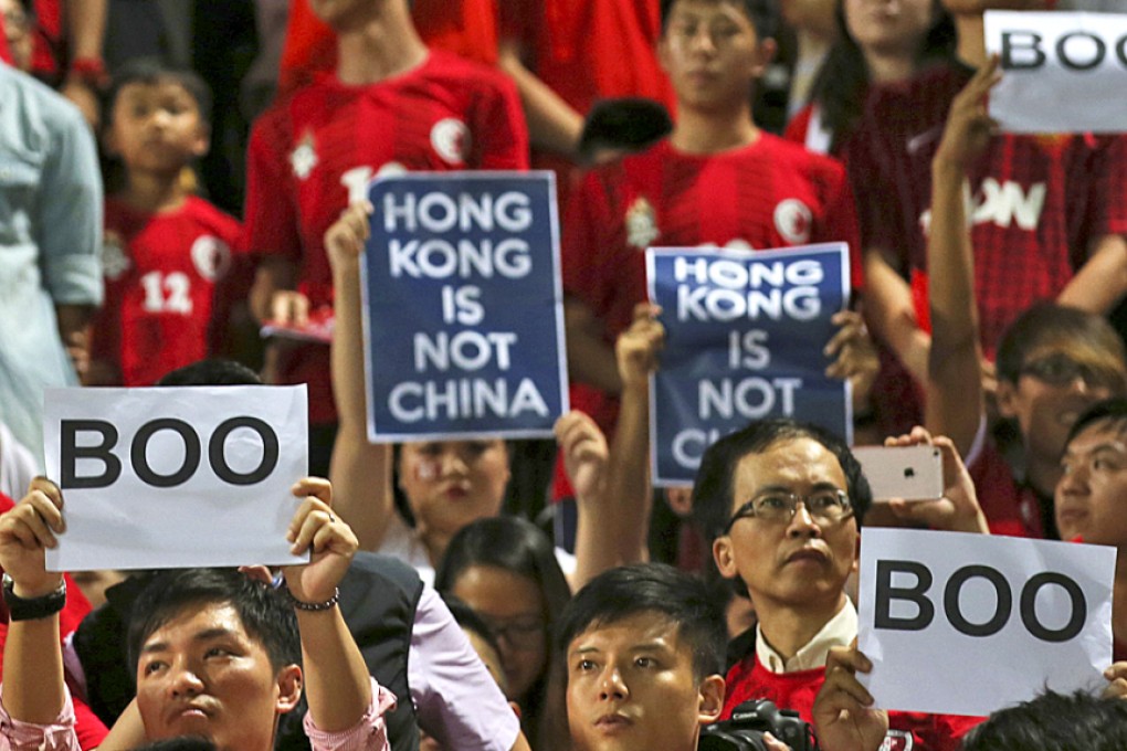 Hong Kong soccer fans boo the Chinese national anthem during the 2018 World Cup Asian qualifying match against China in Hong Kong. Photo: AP