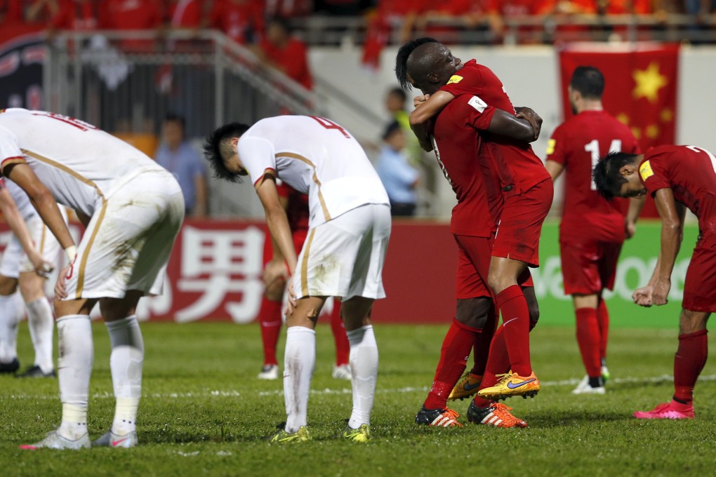 China and Hong Kong players react after Tuesday night's 0-0 draw at Mongkok. Photo: Reuters