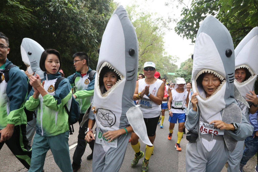 This year's Oxfam Trailwalker is "shark-infested", or so it would seem as participants gather at Pak Tam Chung in Sai Kung. Photo: Felix Wong
