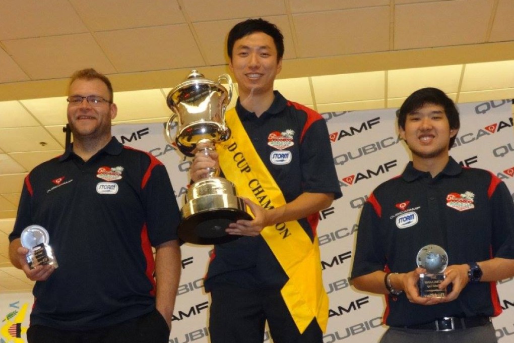 Wu Siu-hong (centre) is on top of the world after lifting the World Cup title in Las Vegas. Photo: QubicaAMF