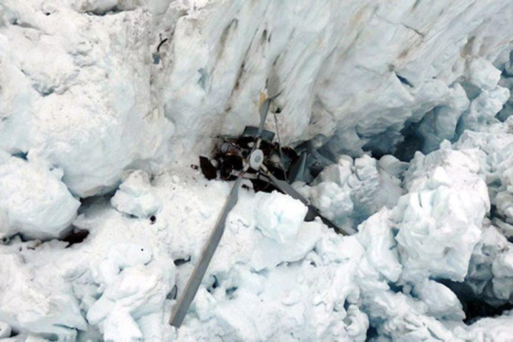 The main part of the chopper is wedged in the crevasse. Photo: EPA