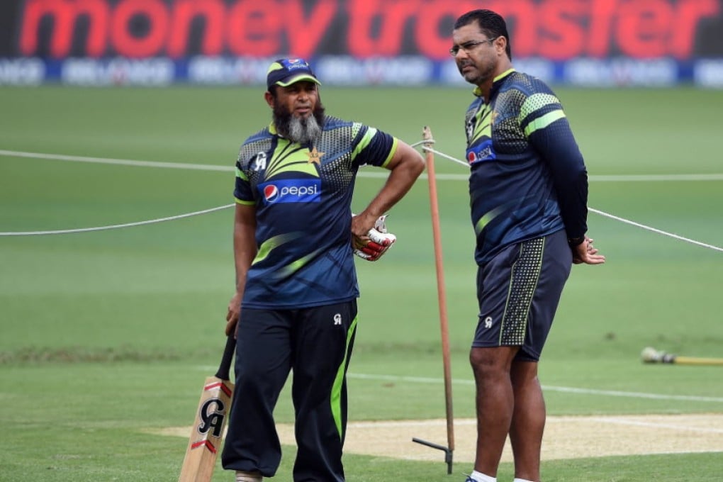 Pakistan coaches Mushtaq Ahmed (left) and Waqar Younis talk during the World Cup earlier this year. Younis refutes allegations of match fixing. Photo: AFP