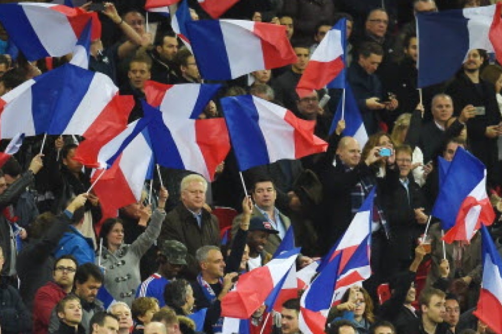 French fans during their team's friendly against England at Wembley. Photos: EPA