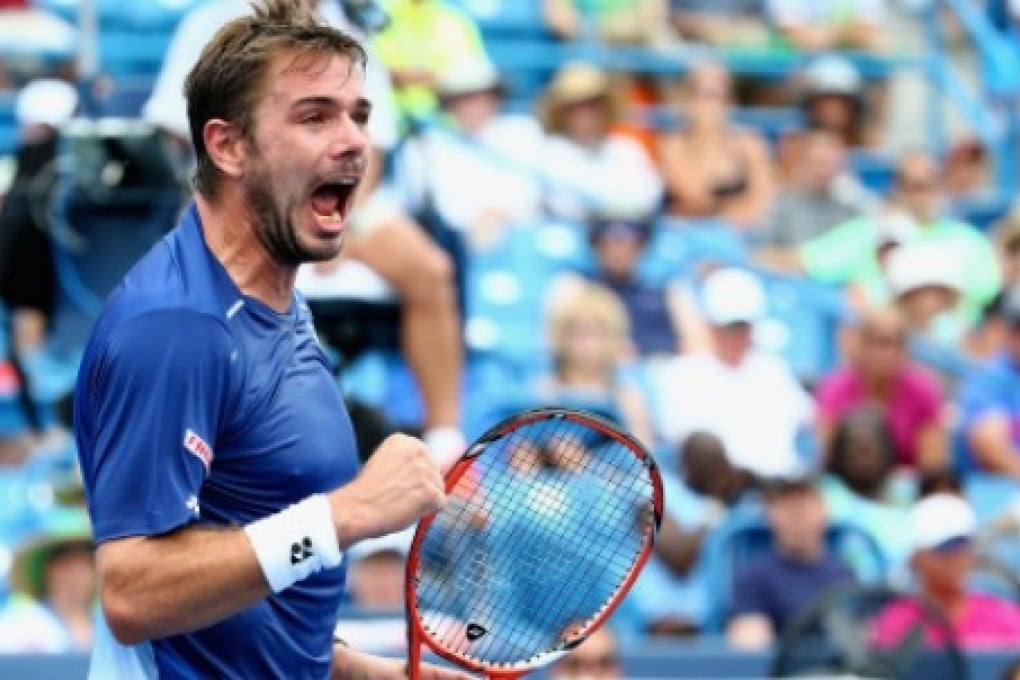 Stan Wawrinka overcame Andy Murray to set up a clash with compatriot Roger Federer. Photo: AFP