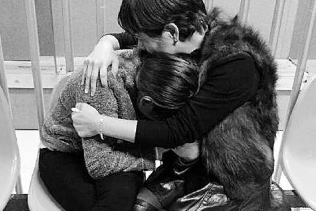 The young woman is reunited with her mother after living rough as a runaway for a decade. Photo: The Qianjiang Evening News