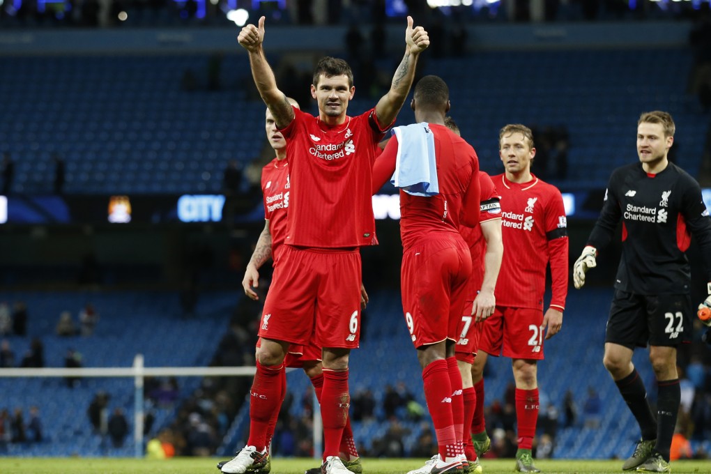 Liverpool's Dejan Lovren celebrates after the game. Photo: Reuters