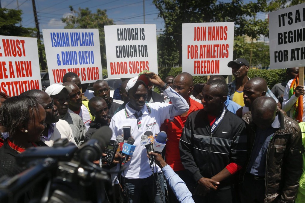 Kenya's athletes leader Jacob Yator talks to the media. Photo: EPA