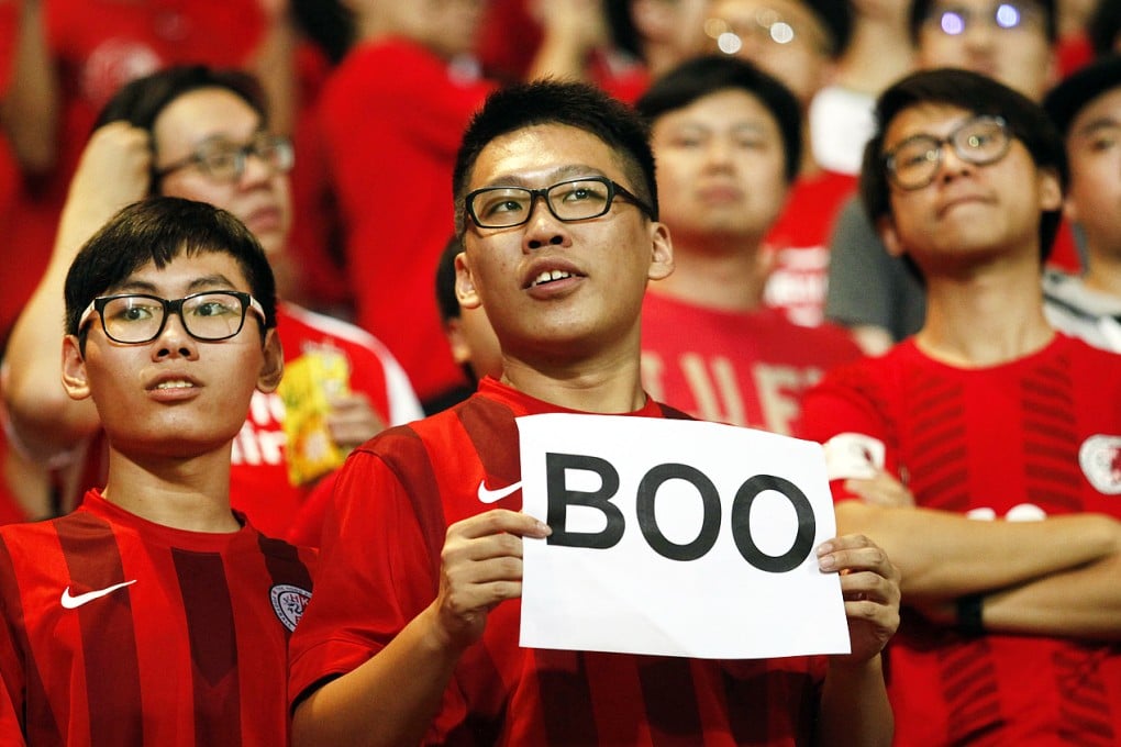 A Hong Kong fan 'voices' his displeasure ahead of the Hong Kong-China World Cup qualifier last week. Photo: AFP