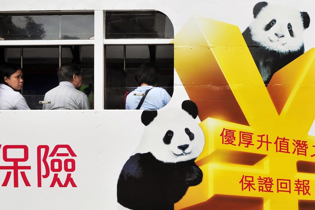 More Chinese are buying insurance policies in the city in the light of China’s economic woes, stock market rout and yuan devaluation. Photo: AFP