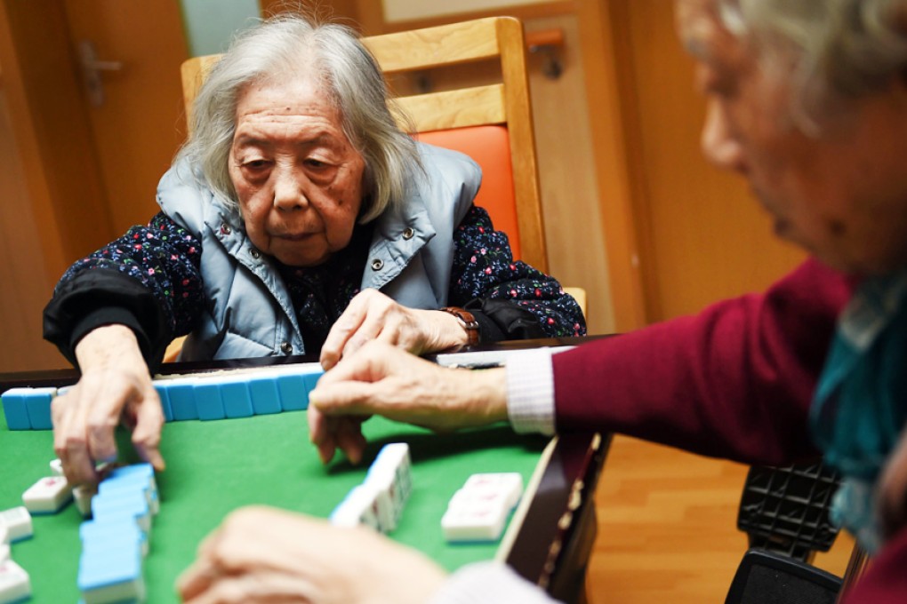 Elderly women playing mahjong at a nursing home in Beijing. Some 15.5 per cent of the population was aged above 60 last year. Photo: AFP