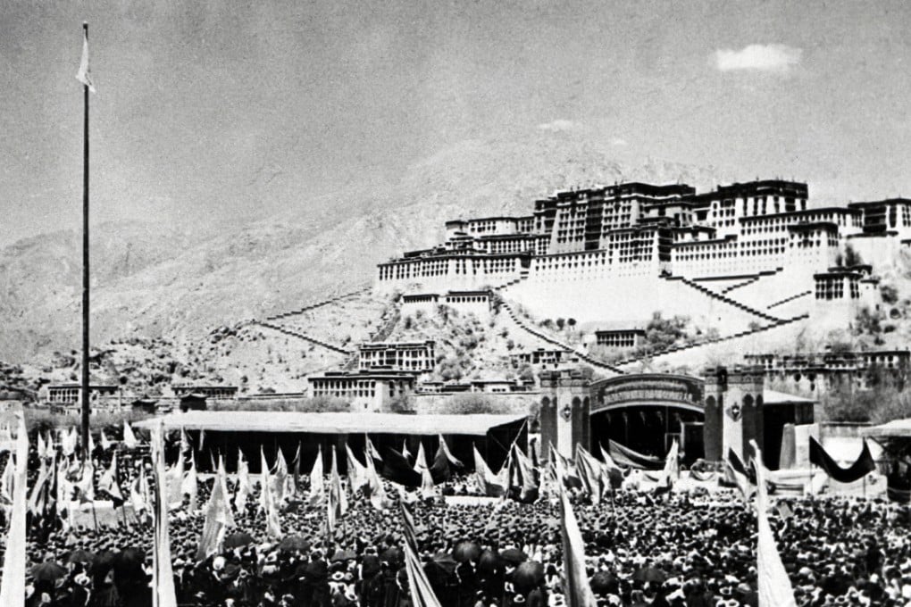 Tibetans gather during an armed uprising against Chinese rule on March 10, 1959 in front of the Potala Palace in Lhasa.