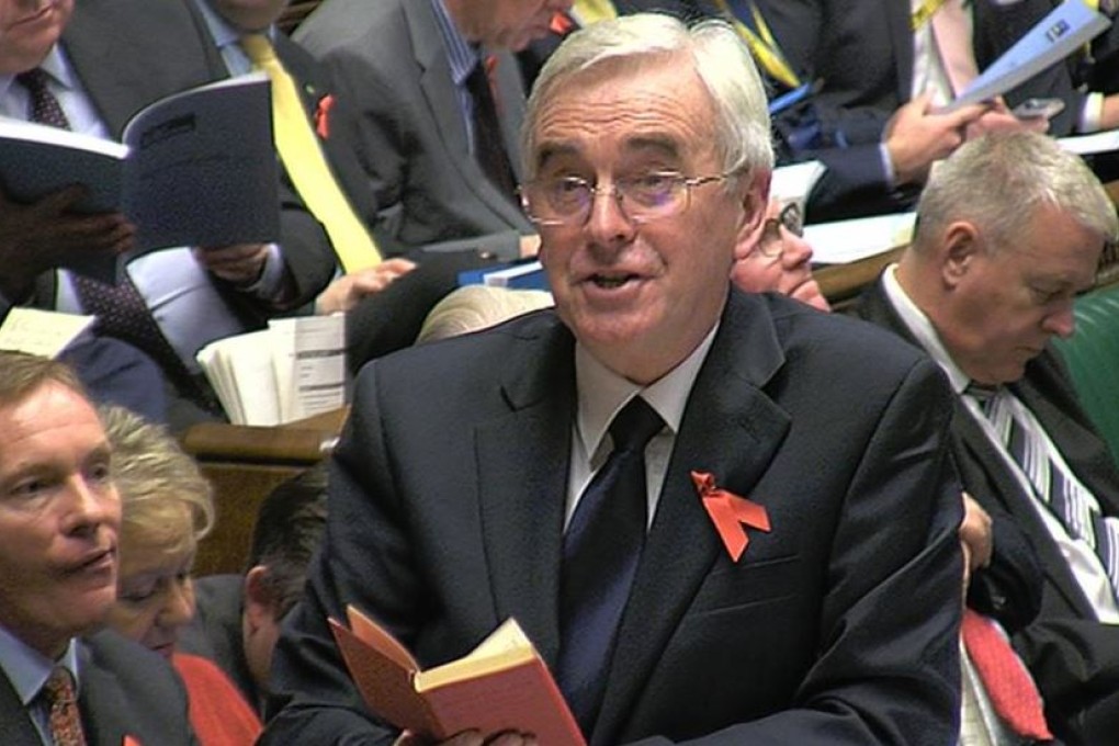 Labour's shadow chancellor John McDonnell quotes from Mao's famous book of quotations. Photo: Reuters