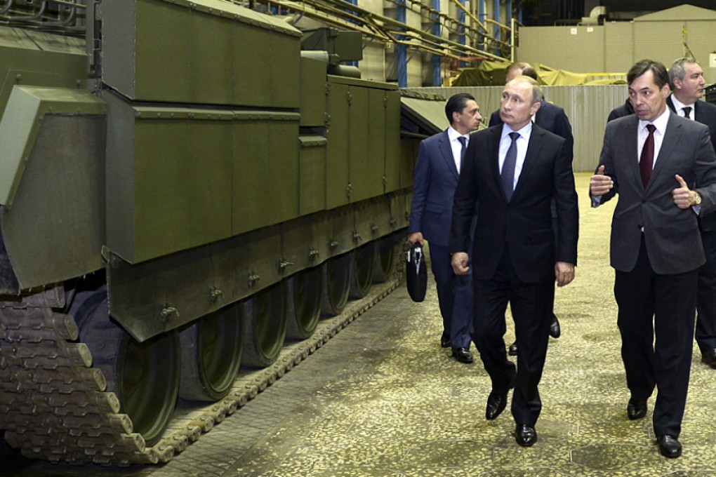 Russian President Vladimir Putin the UralVagonZavod factory in the Ural mountains, Russia on Wednesday. Photo: AP