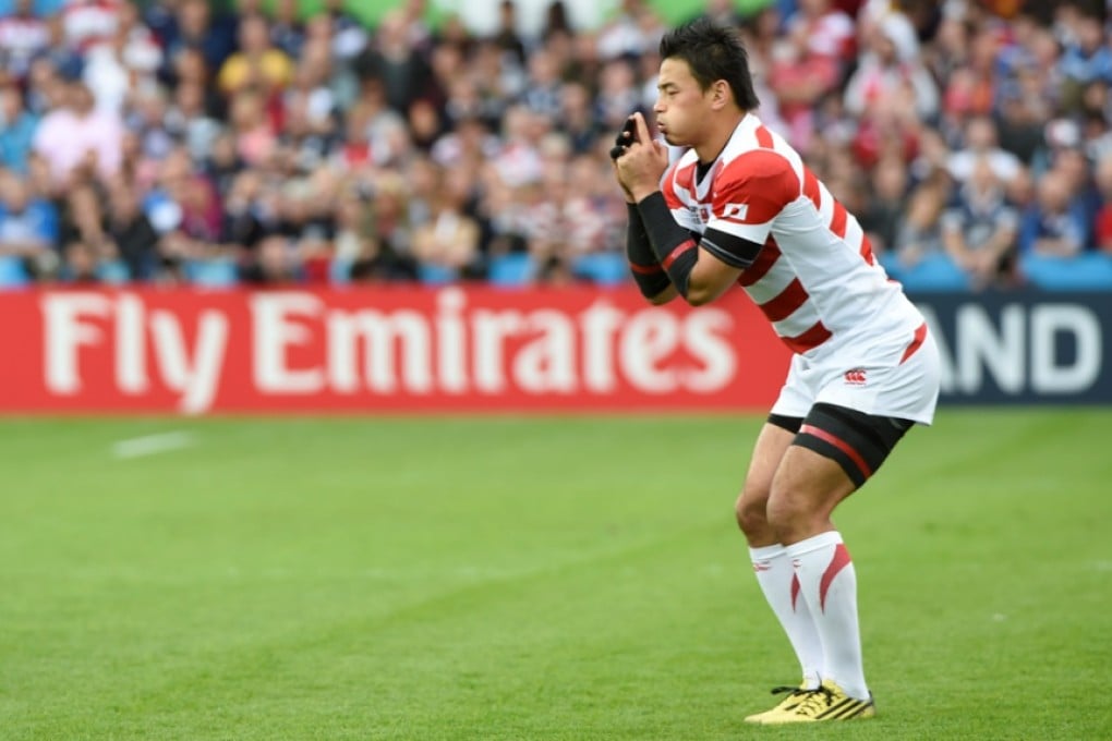Japan pivot Ayumu Goromaru strikes the pose he learned from England great Jonny Wilkinson as he prepares to kick a penalty during the Rugby World Cup. Photo: AFP