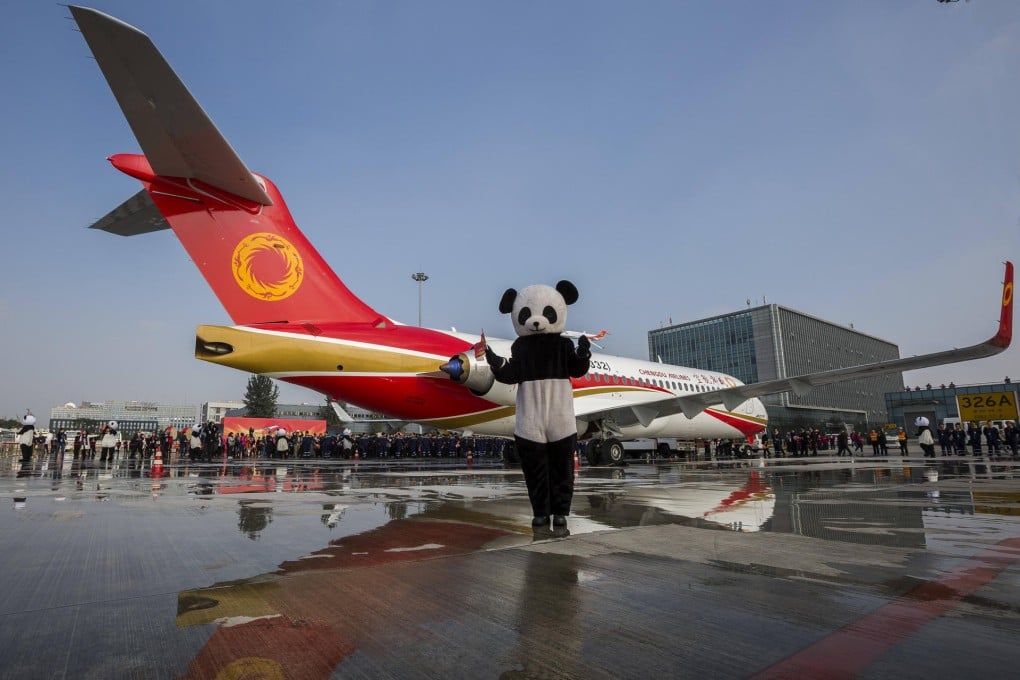 The Comac jet arrives in Chengdu yesterday. Photo: SCMP Pictures